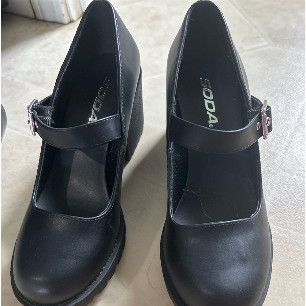 The brand is soda never been worn size 6 1/2 black dress shoes